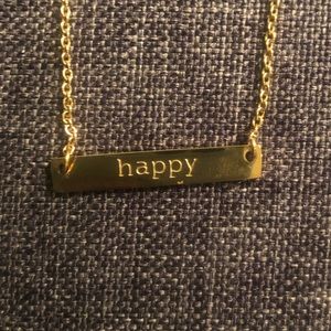 Gold “happy” necklace
